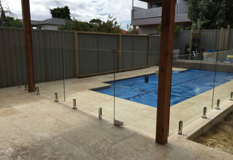 Frameless glass pool fencing with hydro gate