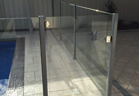 Semi-frameless glass pool fence with square posts